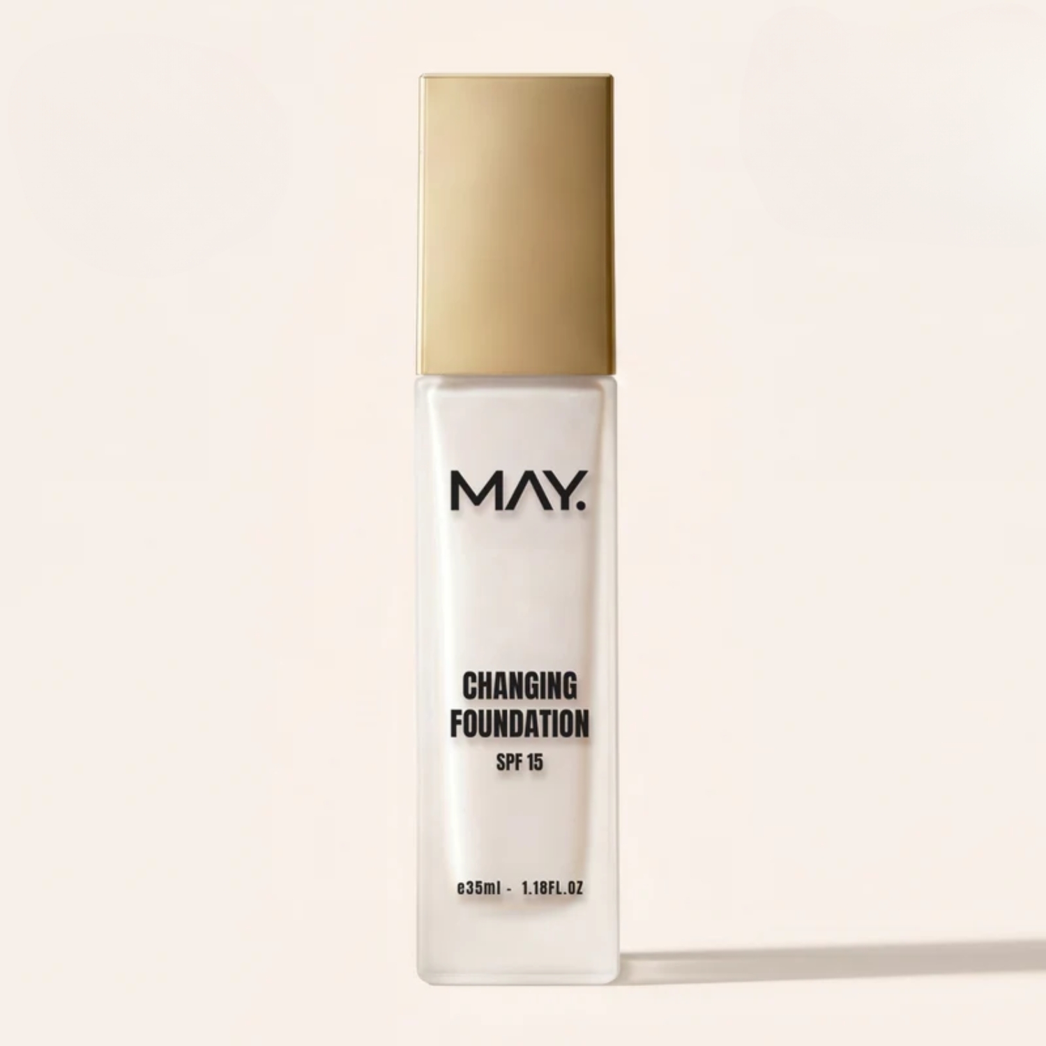 Woman holding May Cosmetics foundation